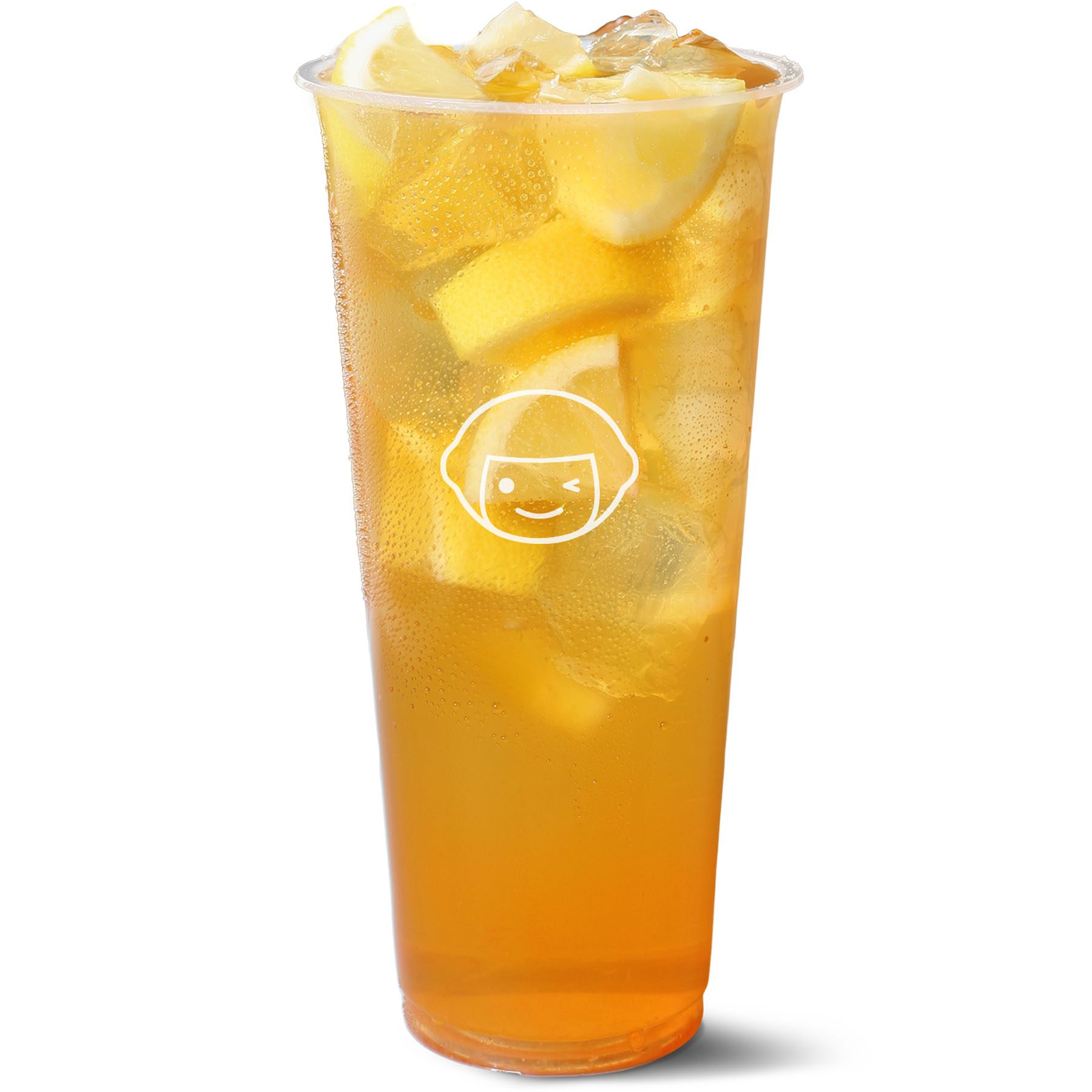 A clear plastic cup filled with iced lemon tea, containing several lemon wedges and ice cubes, with a white cartoon face logo on the cup.