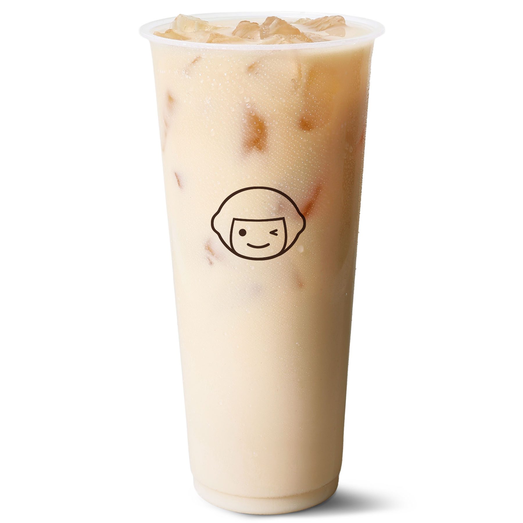 A large plastic cup filled with iced milk tea, featuring a simple winking face logo on the front. The drink is light brown and contains visible ice cubes at the top.