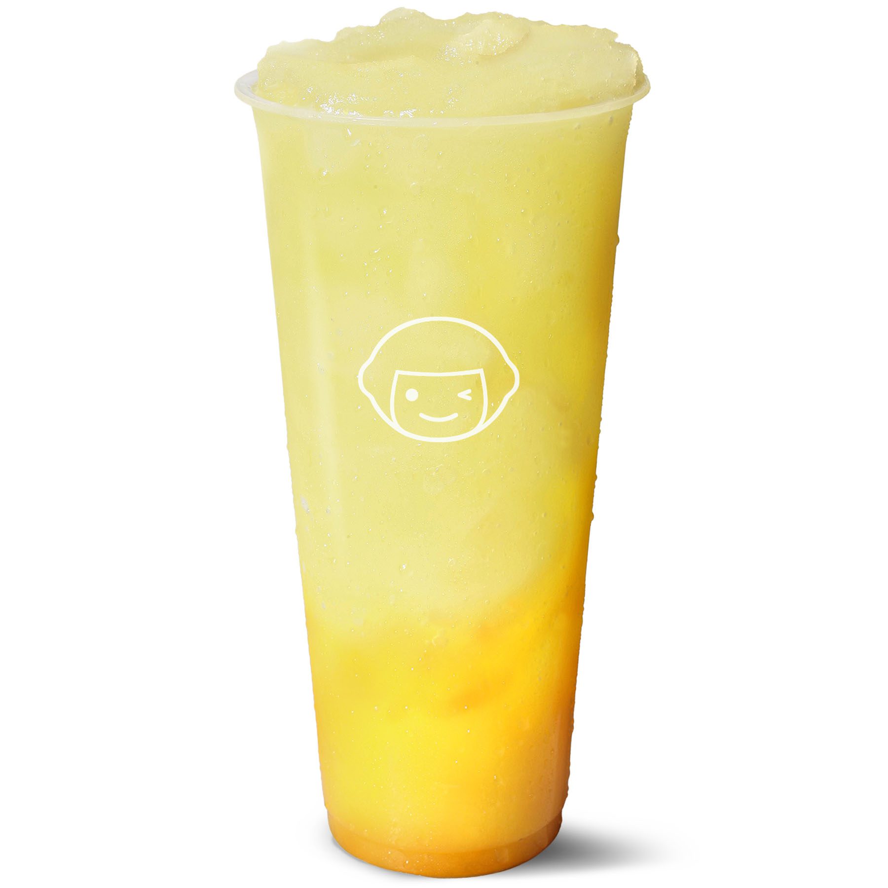 A clear plastic cup filled with a yellow and orange blended frozen drink, featuring a white smiling face logo on the front. The drink has a frothy, icy texture and appears cold with condensation on the cup.