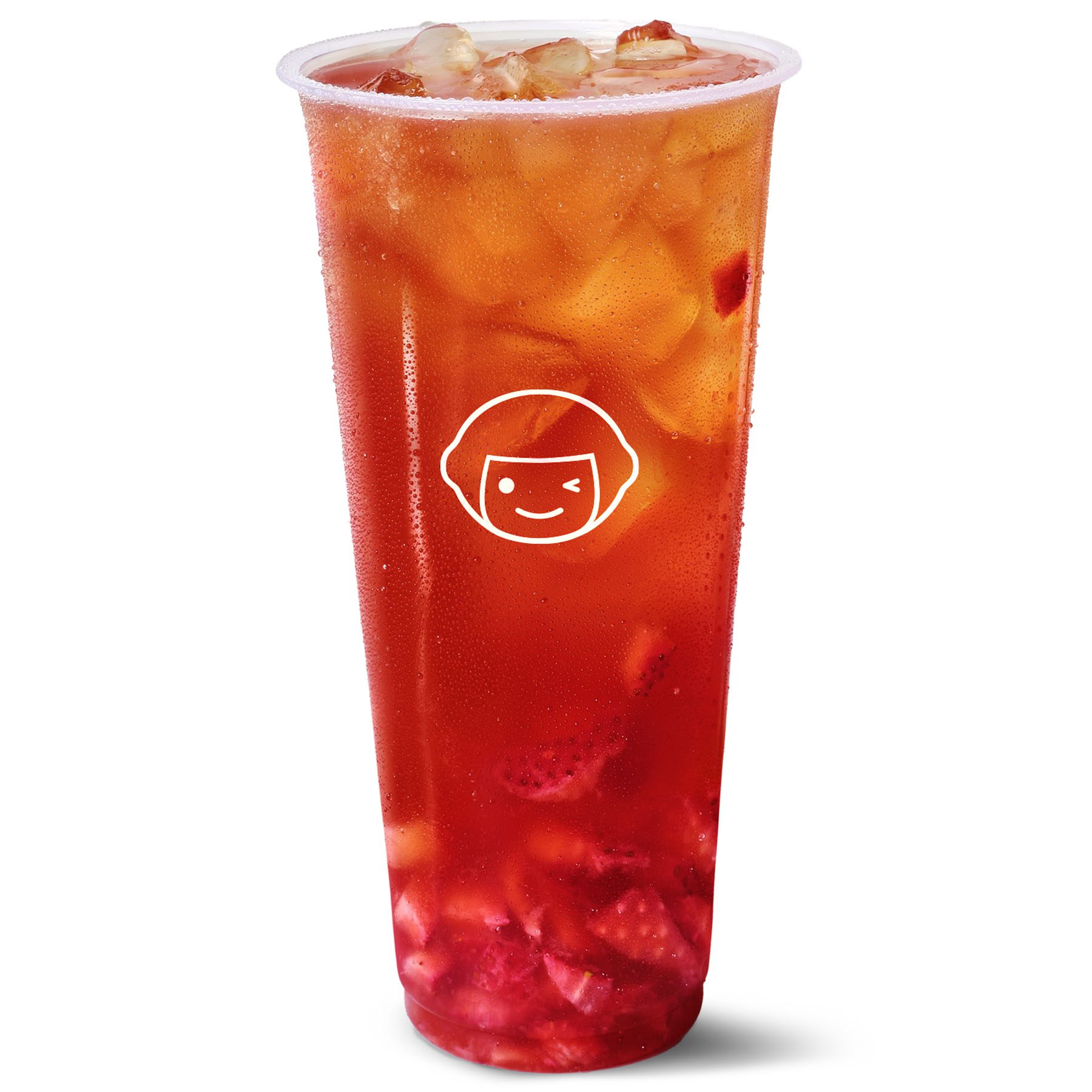A clear plastic cup filled with iced strawberry tea, featuring visible ice cubes and pieces of strawberries, with a white logo of a smiling face on the front of the cup.